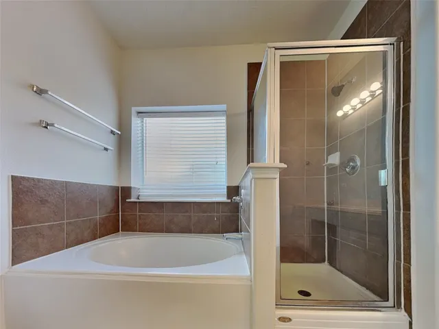 a bathroom with a bathtub