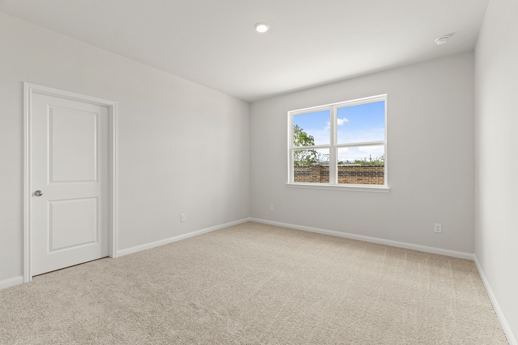 8946 Ice Quartz Drive Iowa Colony, TX 77583 - Photo 5 of 15 an empty room with windows