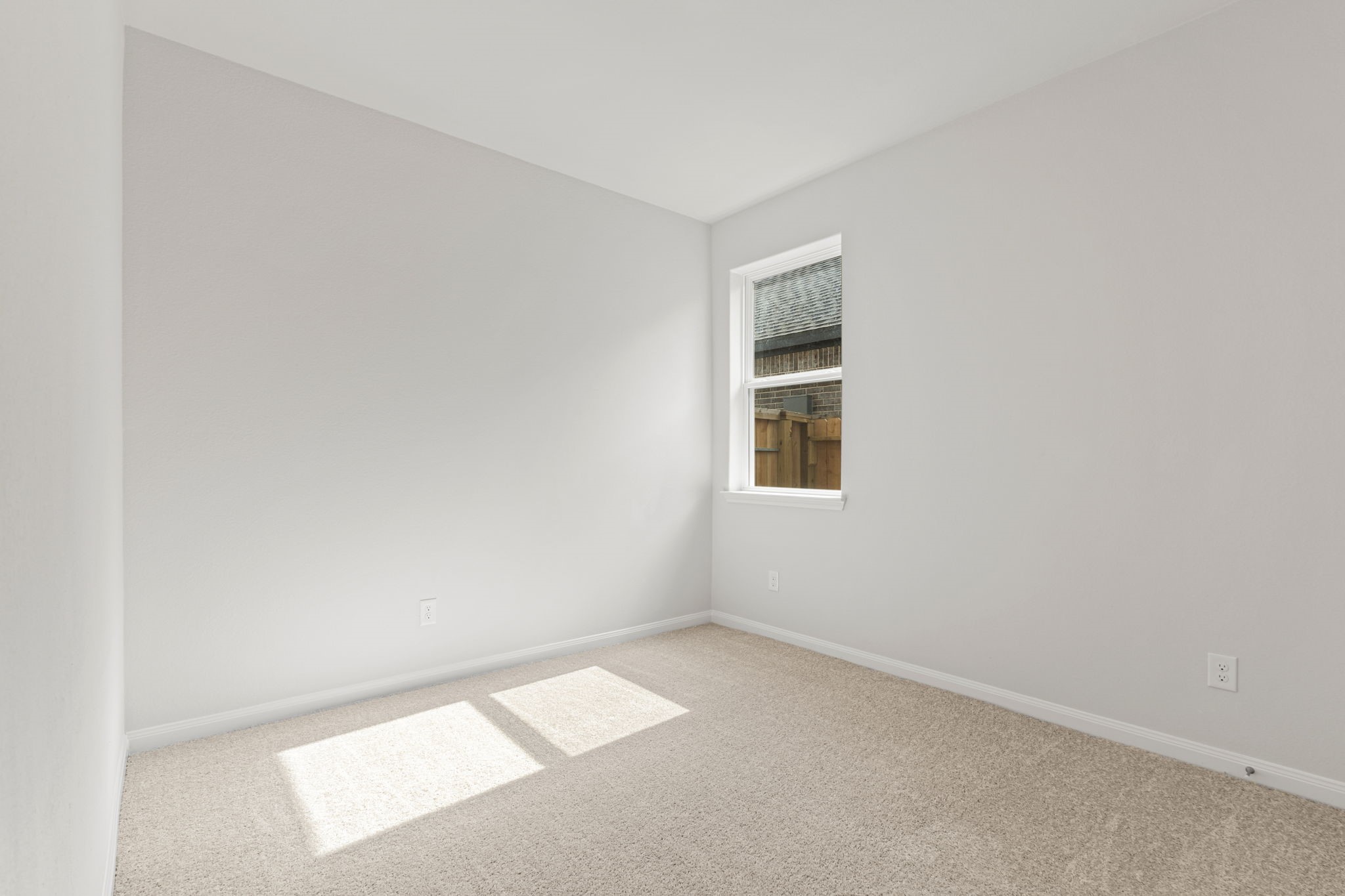 8946 Ice Quartz Drive Iowa Colony, TX 77583 - Photo 8 of 15 an empty room with a window