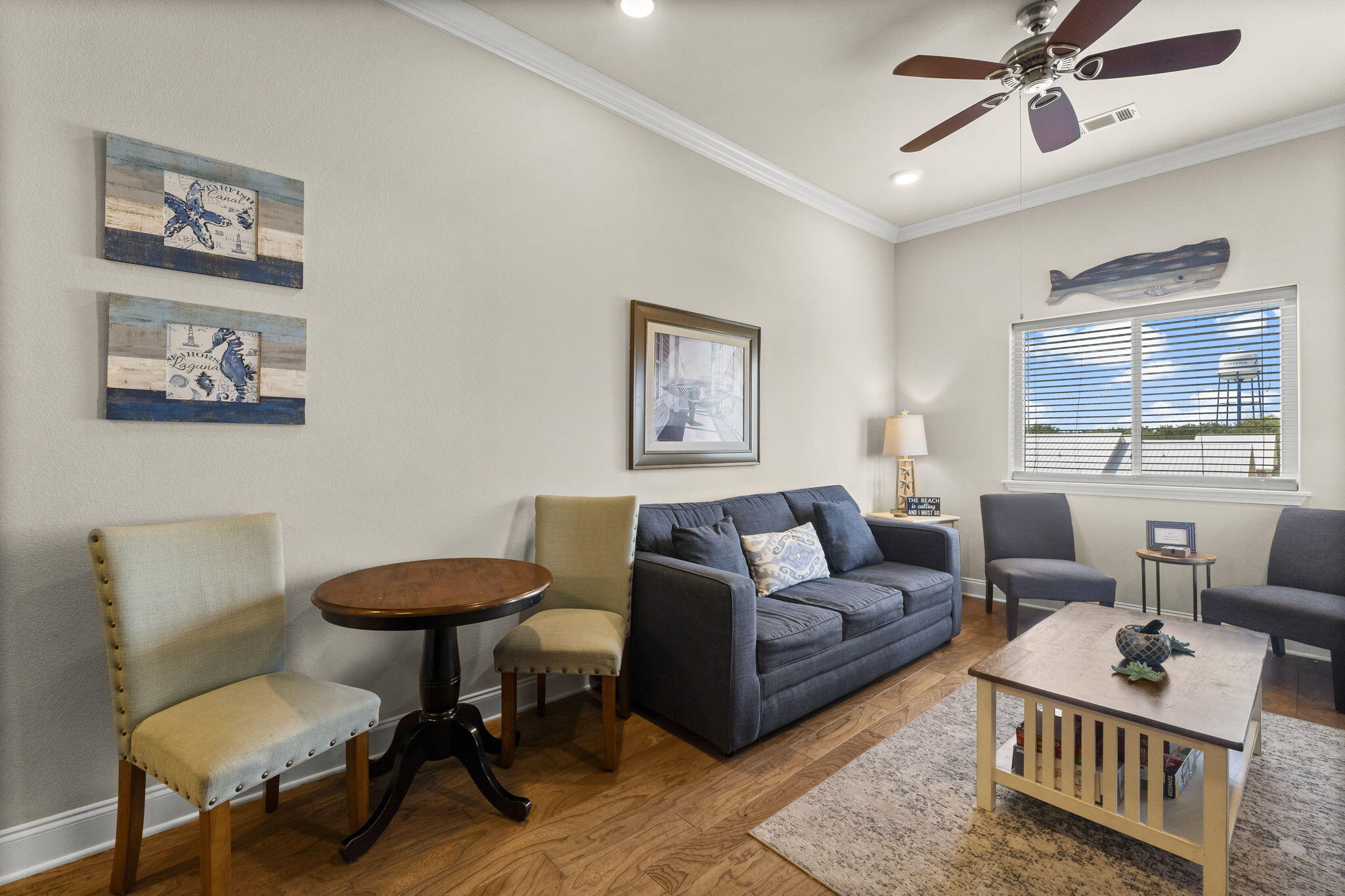 732 Scenic Gulf Drive, Unit E304 Destin, FL 32550 - Photo 16 of 34 a living room with furniture and a window