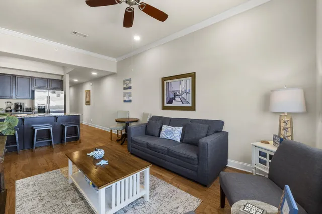 a view of bedroom with a flat tv screen and a dresser
