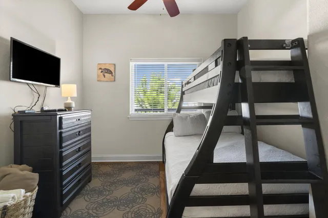 a bedroom with a bed and a view of bathroom