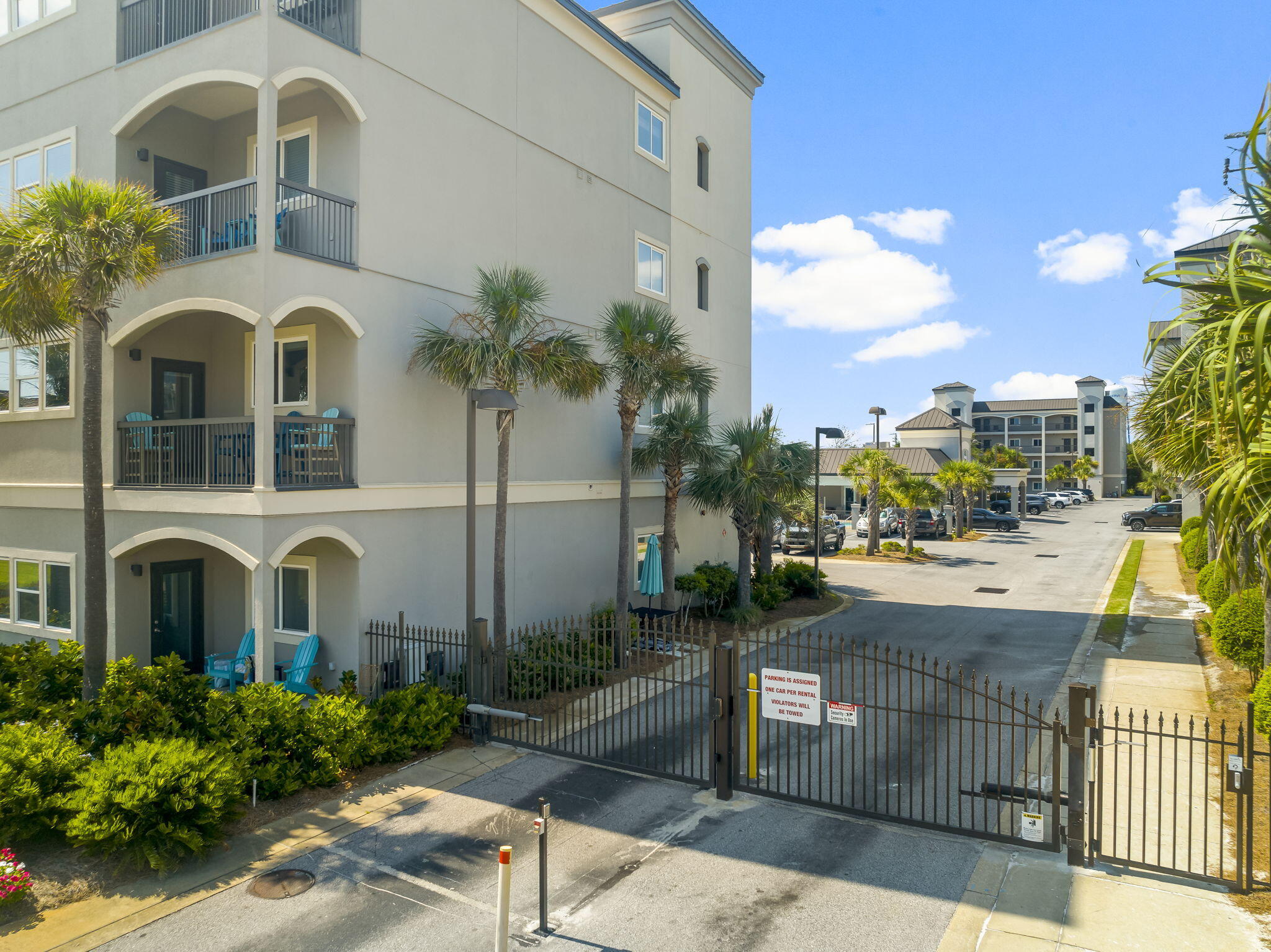 732 Scenic Gulf Drive, Unit E304 Destin, FL 32550 - Photo 34 of 34 a front view of a house with a garden