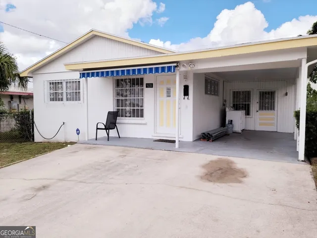 a view of a house with a patio
