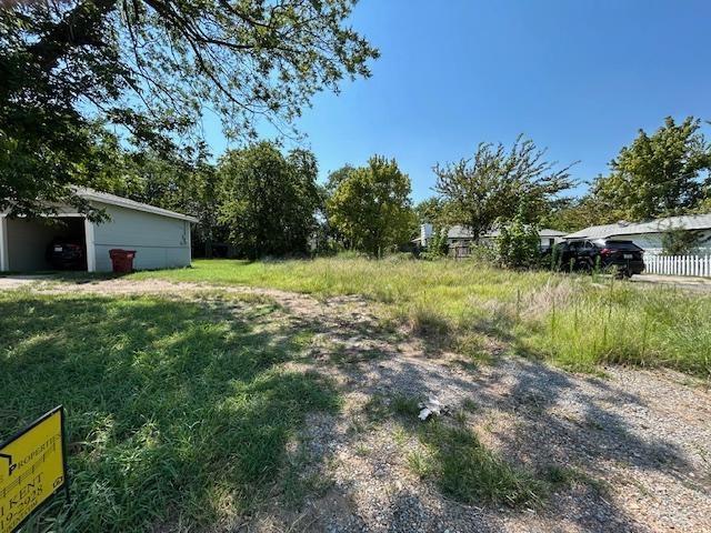 306 South Pecan Street Bells, TX 75414 - Photo 2 of 9 a view of backyard with green space