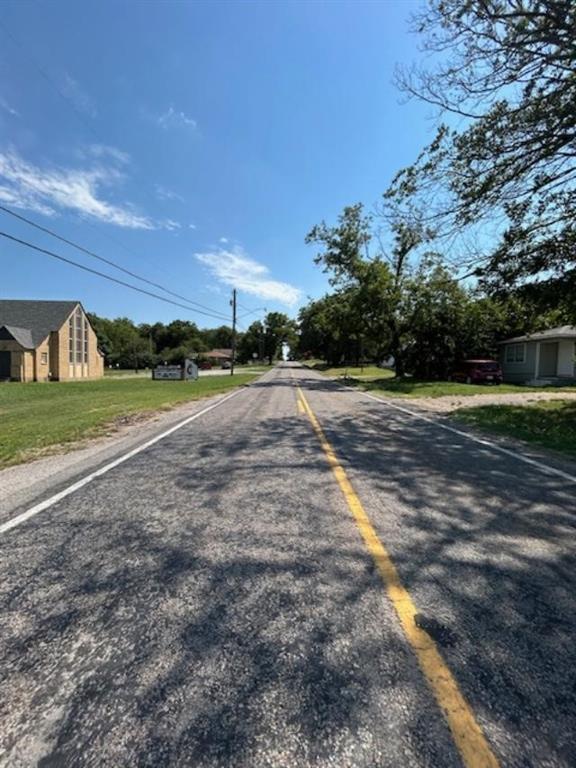 306 South Pecan Street Bells, TX 75414 - Photo 4 of 9 a view of a basketball court