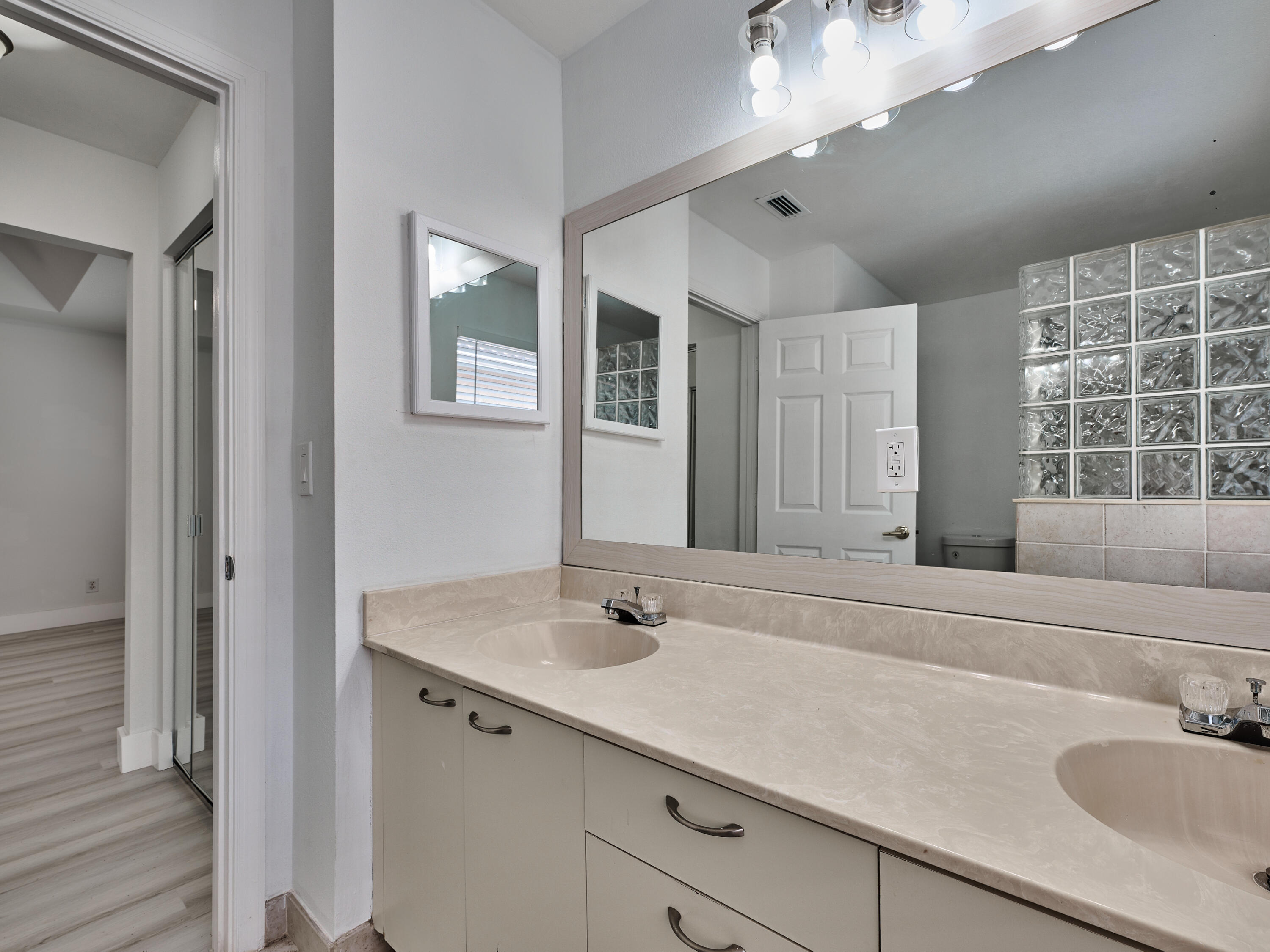 6813 Torch Key Street Lake Worth, FL 33467 - Photo 15 of 30 Primary Bathroom Overlooking bedroom