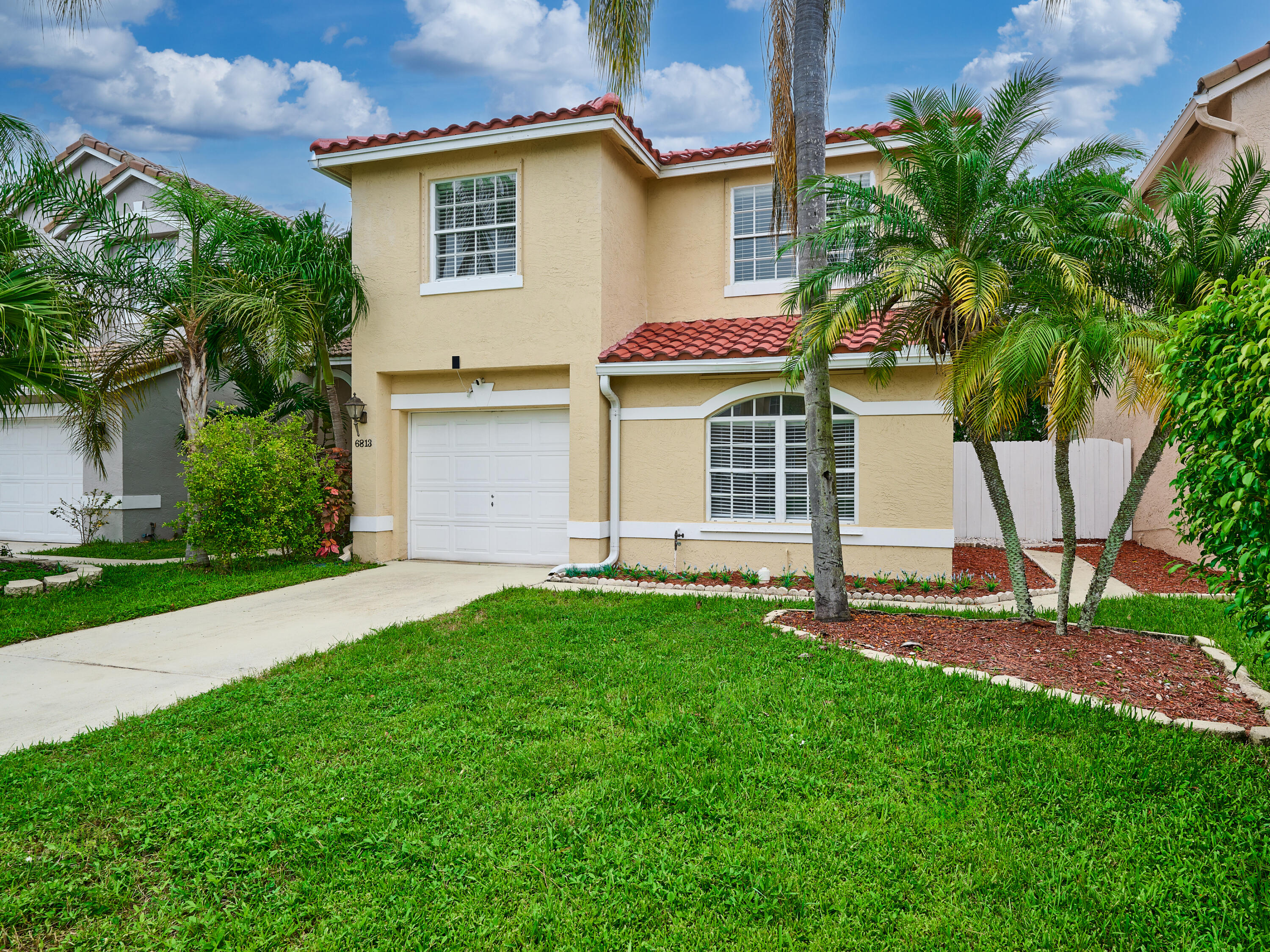 6813 Torch Key Street Lake Worth, FL 33467 - Photo 2 of 30 Long Driveway