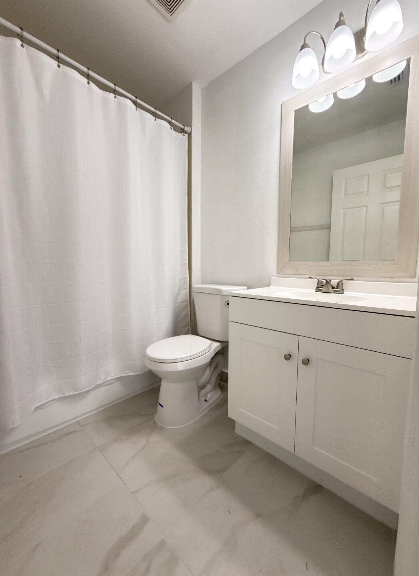 6813 Torch Key Street Lake Worth, FL 33467 - Photo 21 of 30 2nd Bathroom