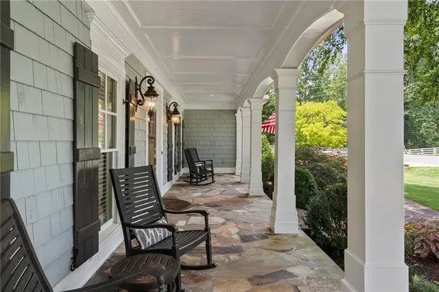 a kitchen with a stove sink and refrigerator