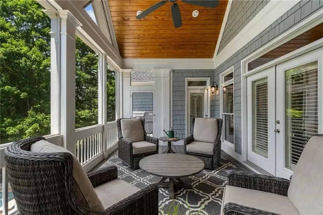 a bathroom with a sink a toilet and shower curtain