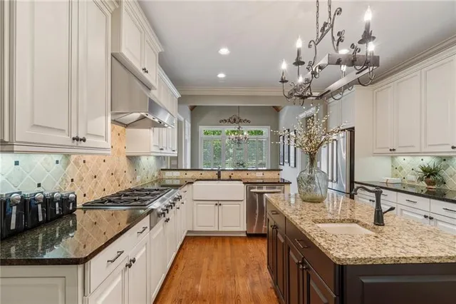 a view of a house with swimming pool and porch with furniture