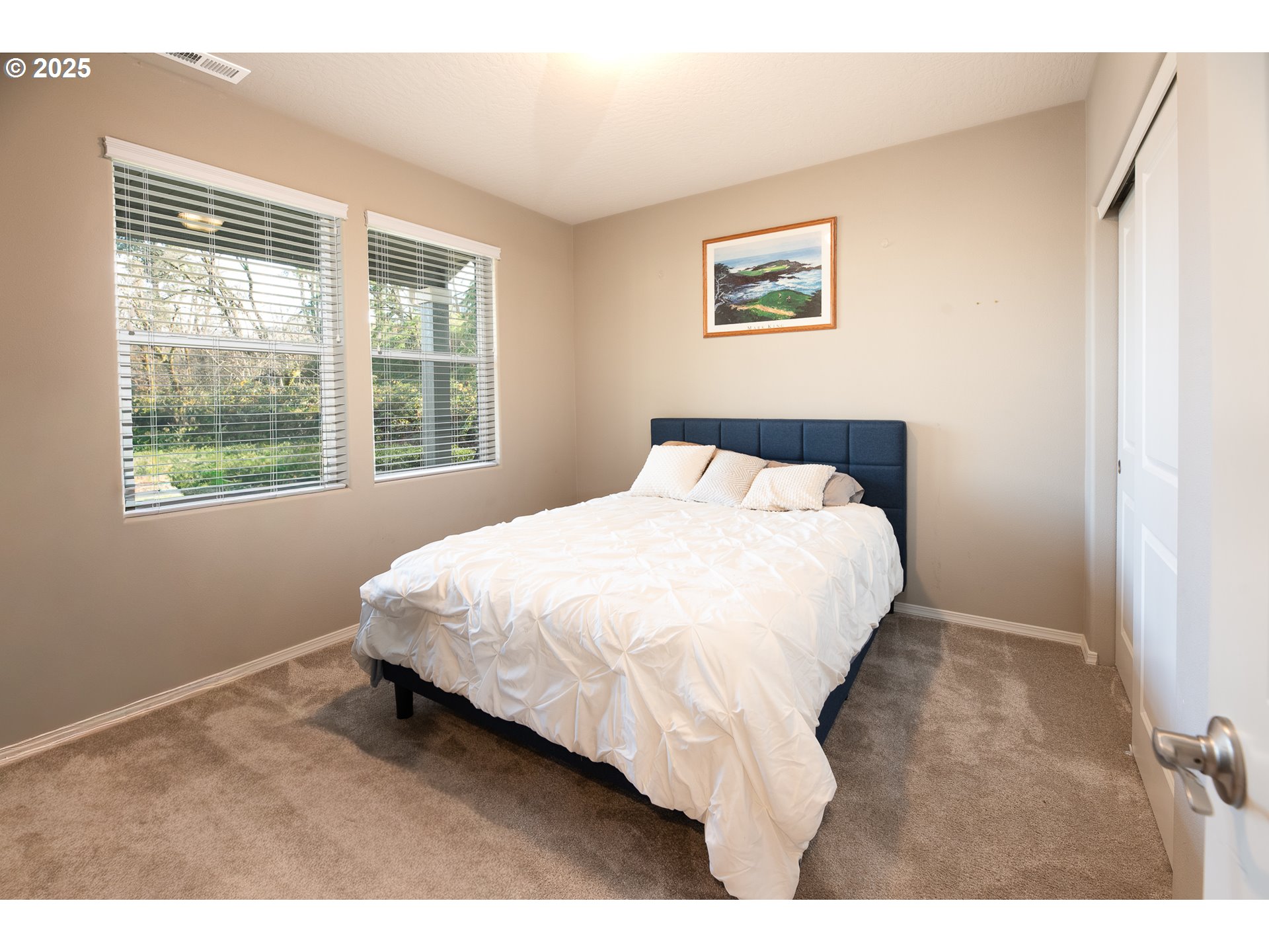 792 South 52nd Place Springfield, OR 97478 - Photo 14 of 45 a bedroom with a bed and a window