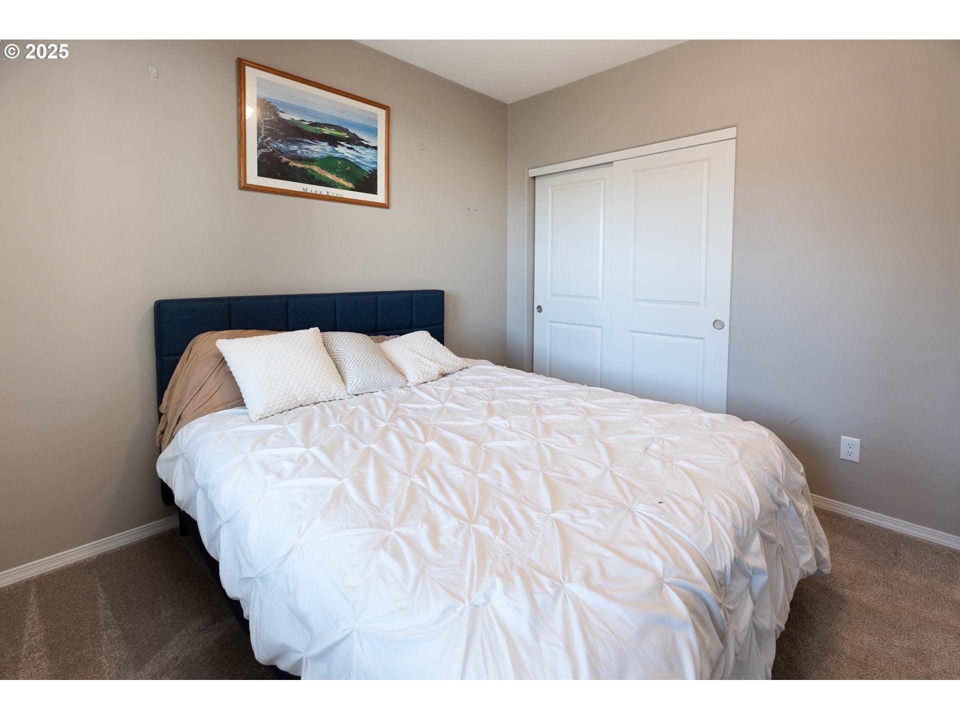792 South 52nd Place Springfield, OR 97478 - Photo 15 of 45 a bedroom with a bed and painting on the wall