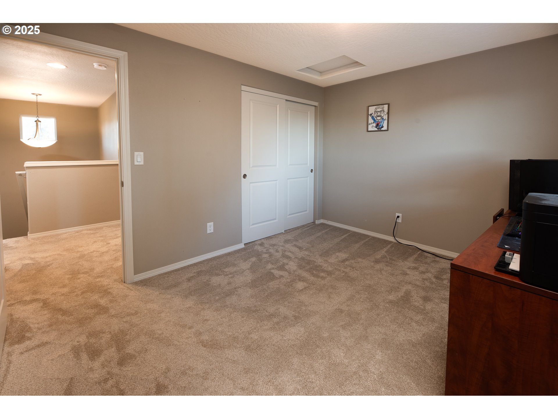 792 South 52nd Place Springfield, OR 97478 - Photo 28 of 45 a view of a livingroom with an empty space a ceiling fan and windows