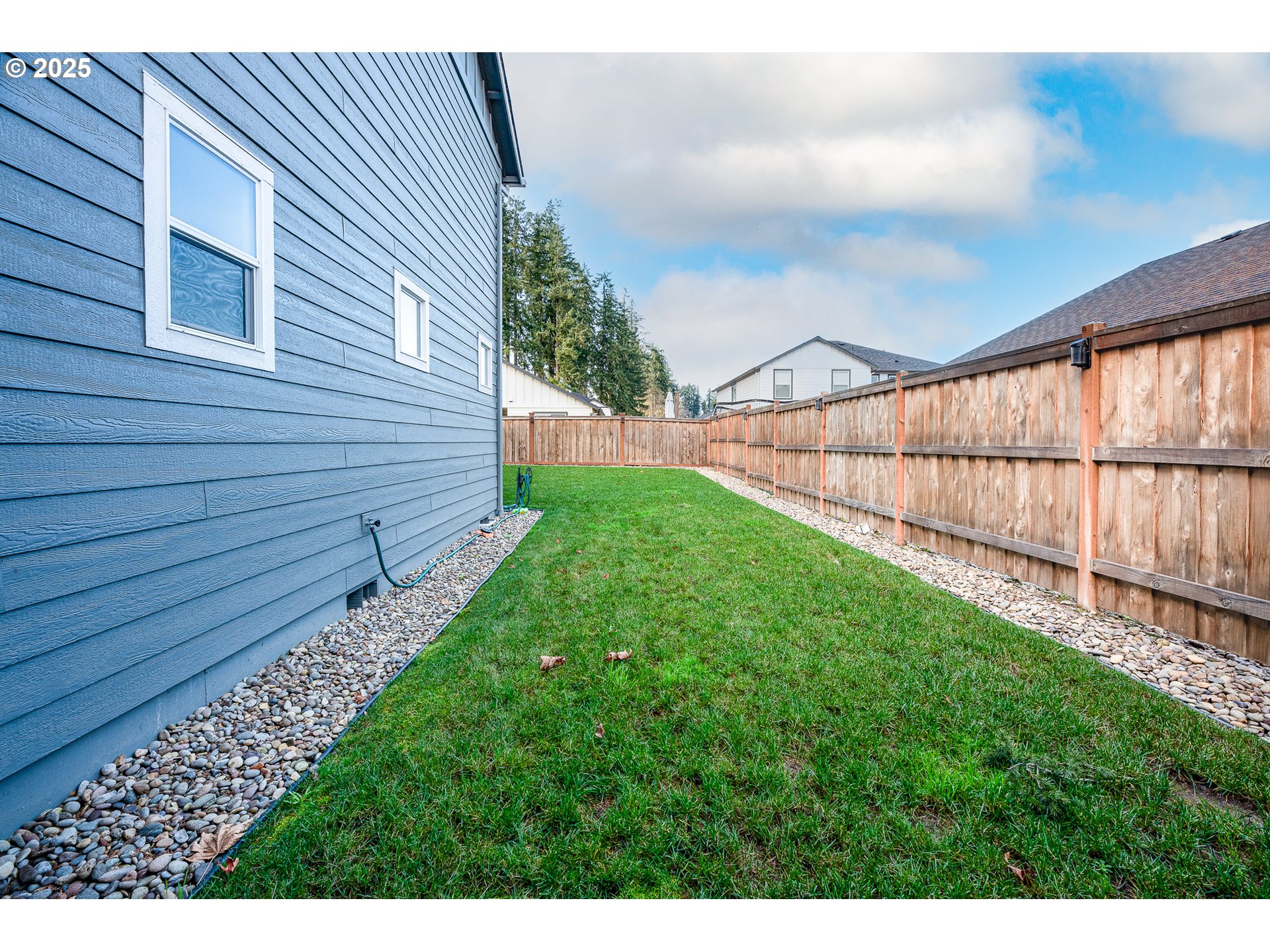 792 South 52nd Place Springfield, OR 97478 - Photo 35 of 45 a view of a backyard with wooden fence