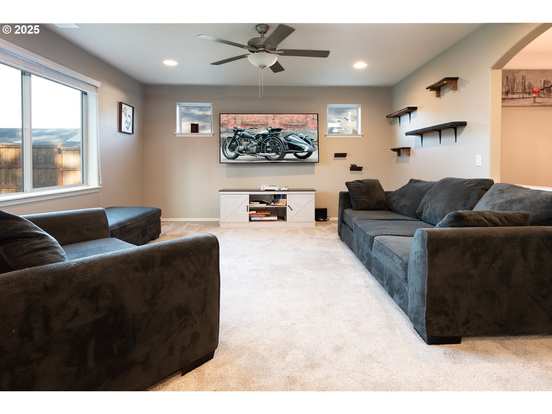792 South 52nd Place Springfield, OR 97478 - Photo 5 of 45 a living room with furniture and a flat screen tv