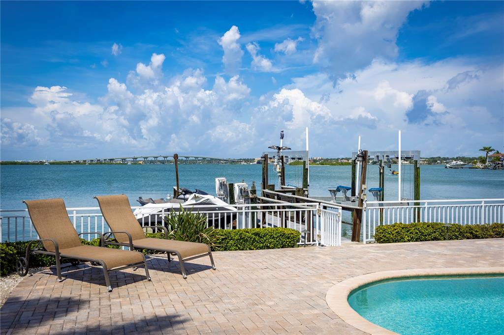306 Harbor Drive Indian Rocks Beach, FL 33785 - Photo 3 of 58 a view of a terrace with sitting area