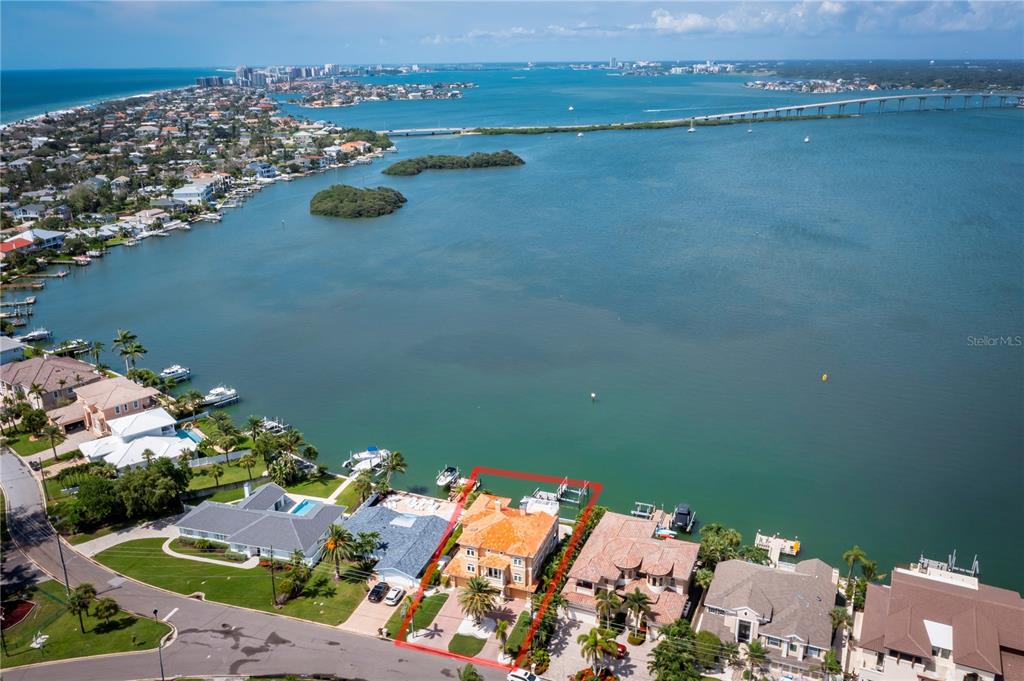 306 Harbor Drive Indian Rocks Beach, FL 33785 - Photo 55 of 58 an aerial view of a house with a lake view