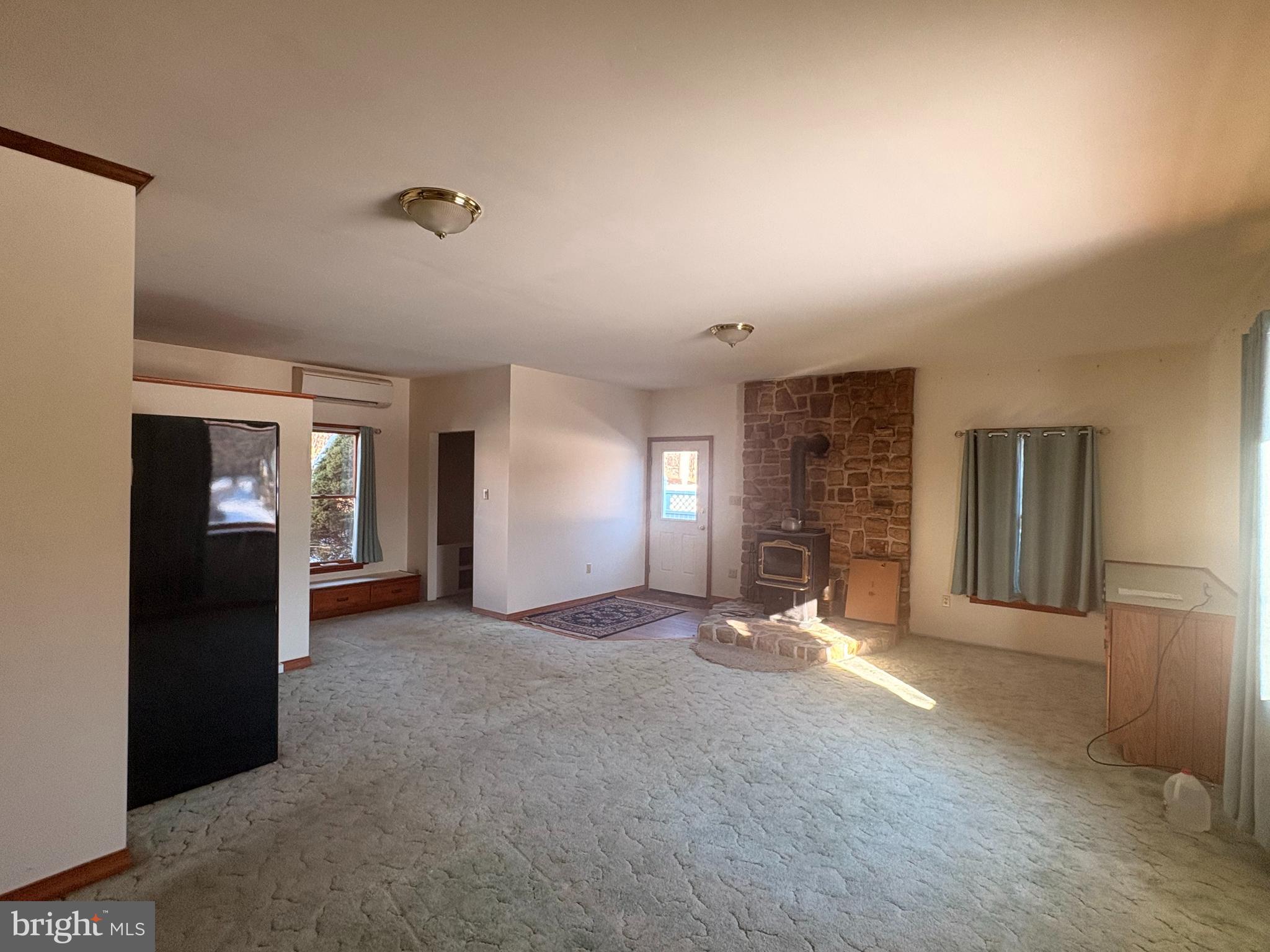 3189 Powells Valley Road Halifax, PA 17032 - Photo 13 of 44 a view of a livingroom with a fireplace