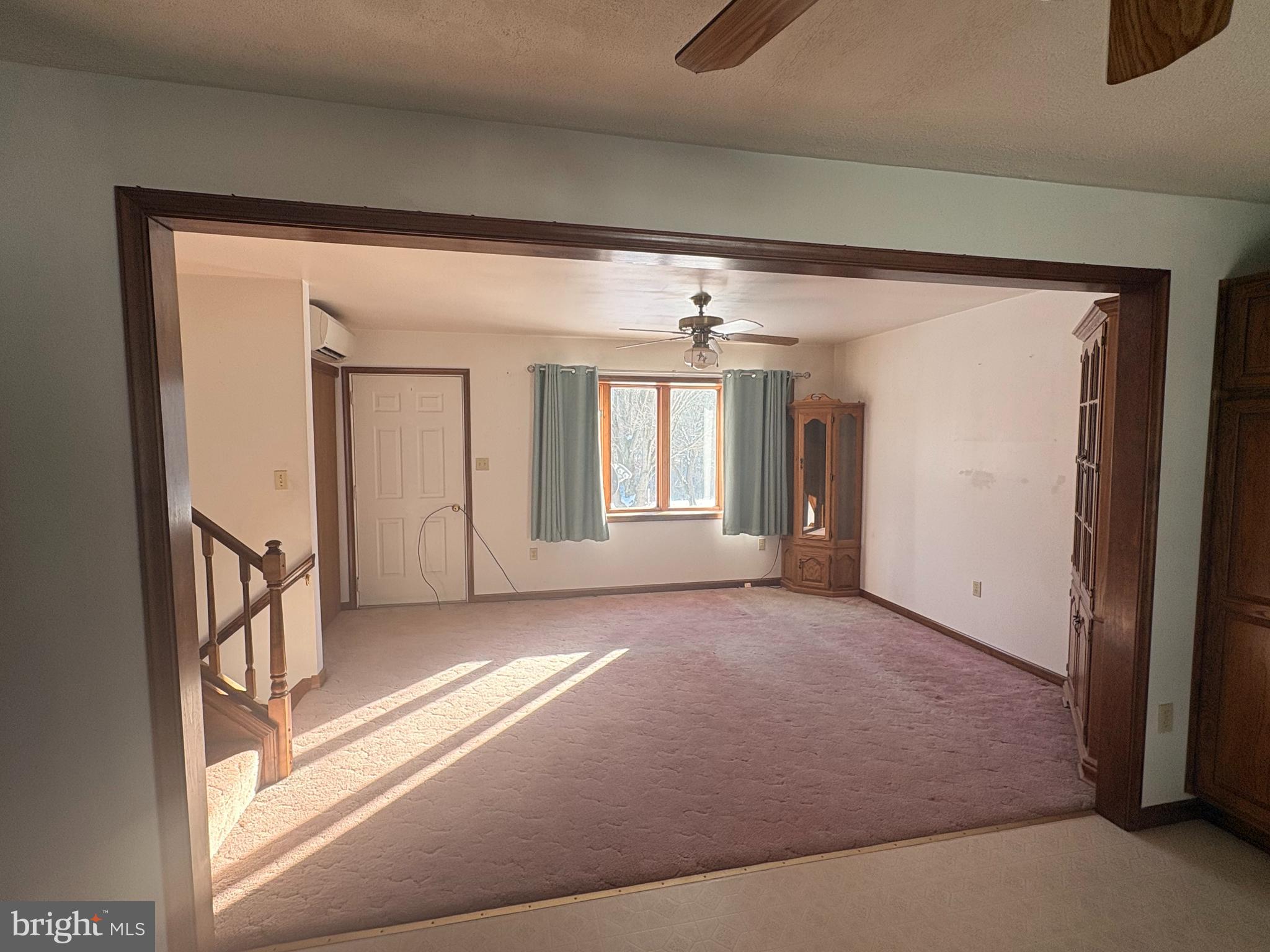 3189 Powells Valley Road Halifax, PA 17032 - Photo 6 of 44 a view of a big room with windows and chandelier