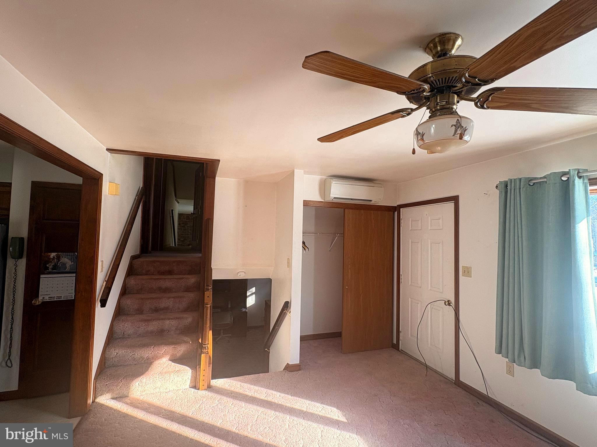 3189 Powells Valley Road Halifax, PA 17032 - Photo 8 of 44 a view of a hallway with a chandelier fan and entryway