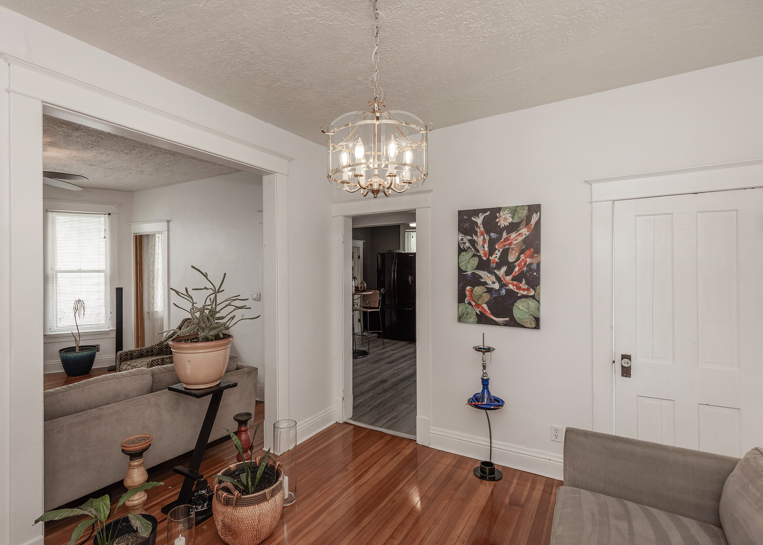 1839 15th Street Moline, IL 61265 - Photo 17 of 32 a room with furniture and wooden floor