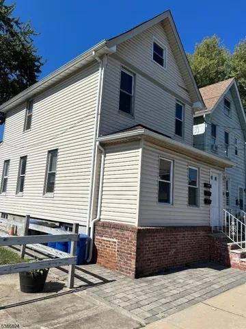 a house view with a outdoor space