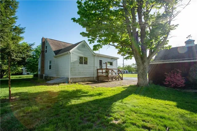 a front view of a house with a garage