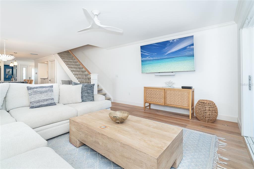 301 South Gulf Boulevard, Unit 25 Placida, FL 33946 - Photo 20 of 68 a living room with furniture and a flat screen tv