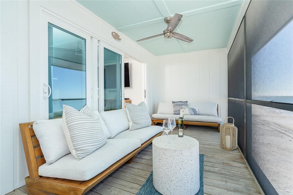 301 South Gulf Boulevard, Unit 25 Placida, FL 33946 - Photo 25 of 68 a living room with furniture and a wooden floor