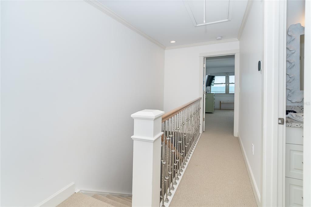 301 South Gulf Boulevard, Unit 25 Placida, FL 33946 - Photo 29 of 68 a view of a hallway with wooden floor and entryway