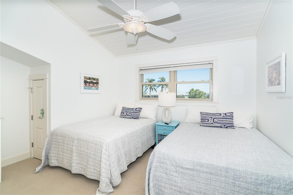 301 South Gulf Boulevard, Unit 25 Placida, FL 33946 - Photo 30 of 68 a bedroom with two beds and painting on the wall