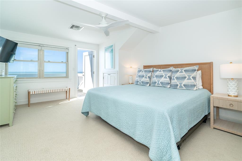 301 South Gulf Boulevard, Unit 25 Placida, FL 33946 - Photo 32 of 68 a bedroom with a bed and a large window