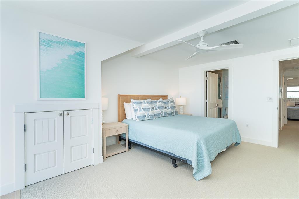 301 South Gulf Boulevard, Unit 25 Placida, FL 33946 - Photo 33 of 68 a bedroom with a bed and a cabinets