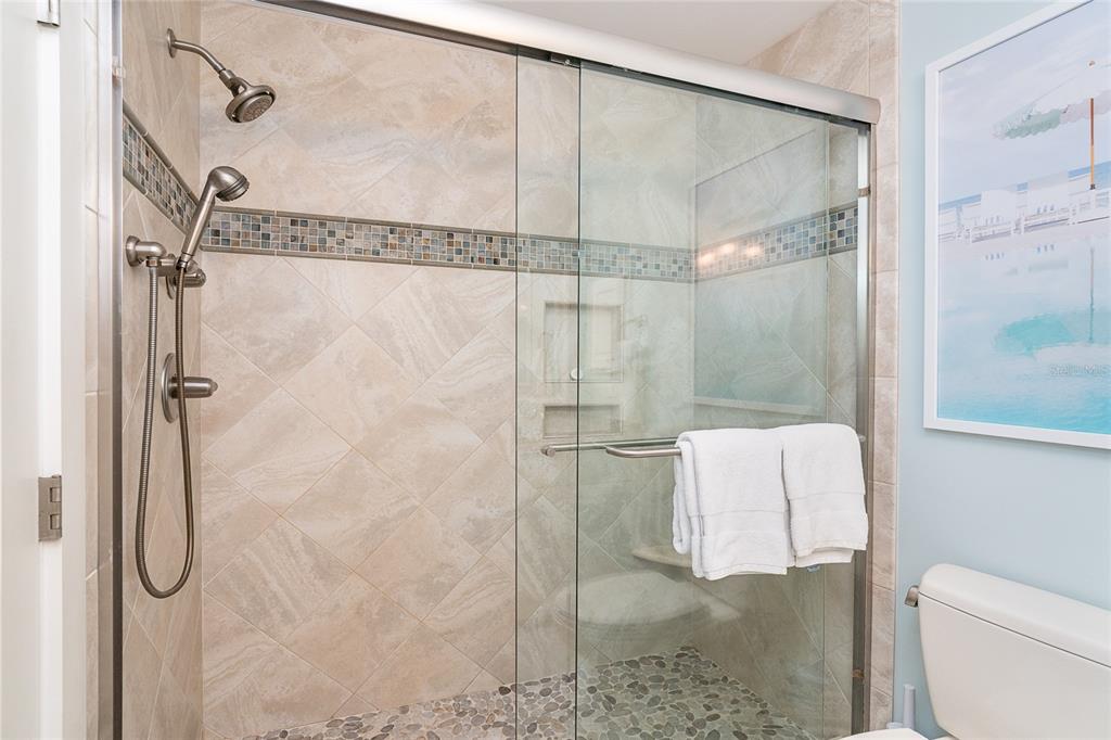 301 South Gulf Boulevard, Unit 25 Placida, FL 33946 - Photo 39 of 68 a bathroom with a shower and toilet