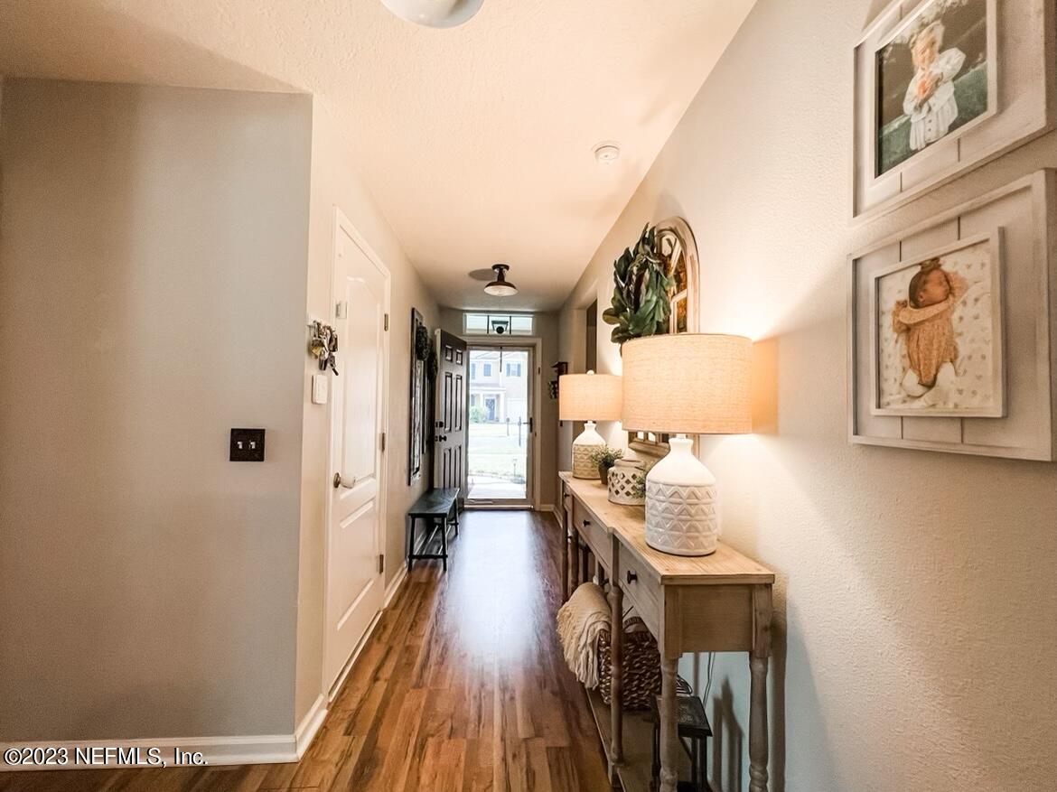 45190 Dutton Way Callahan, FL 32011 - Photo 2 of 29 a living room with furniture and wooden floor