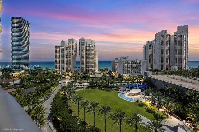 a view of a city with tall buildings