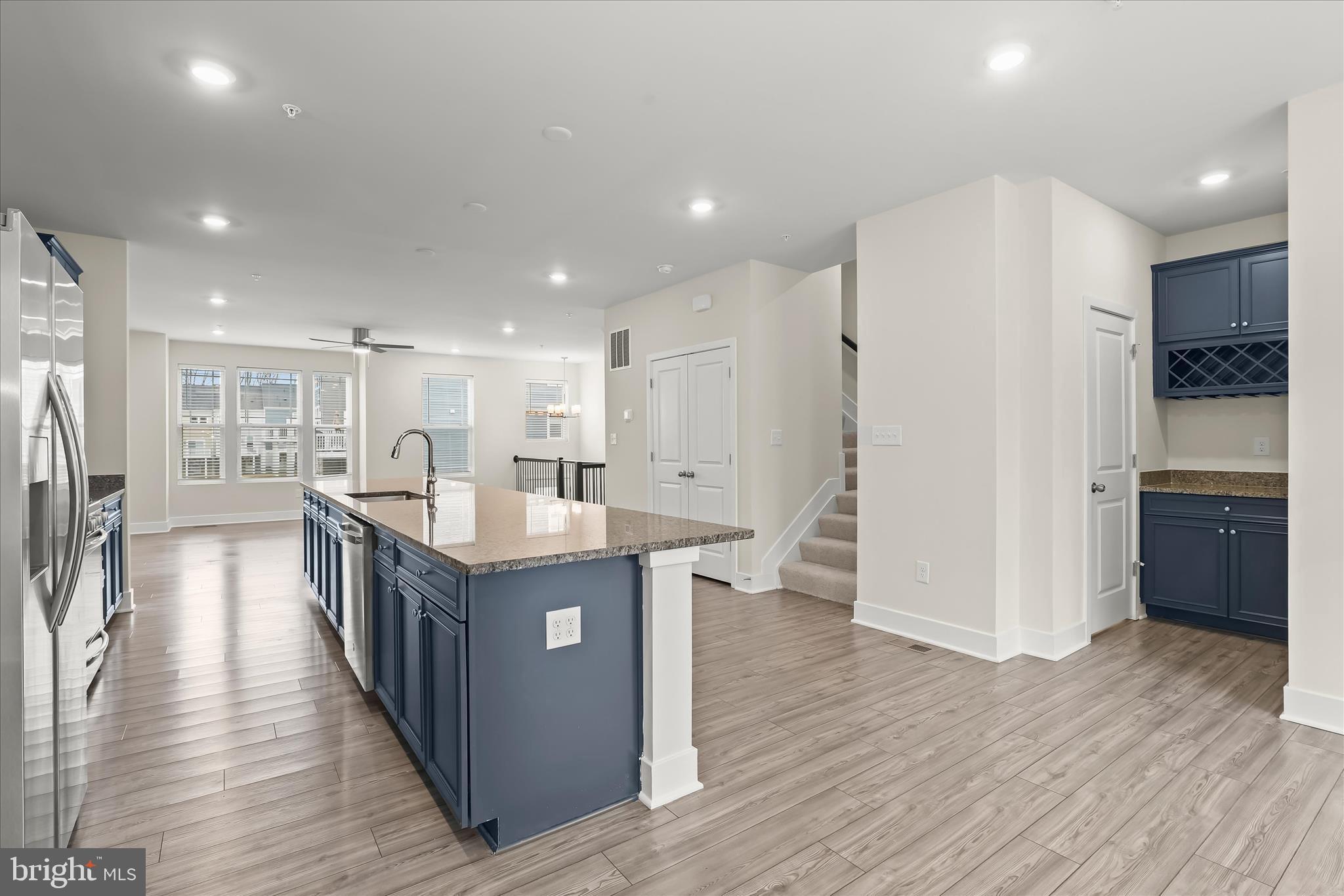 304 Sweetbay Road Essex, MD 21221 - Photo 8 of 66 a kitchen with stainless steel appliances granite countertop a stove and a refrigerator