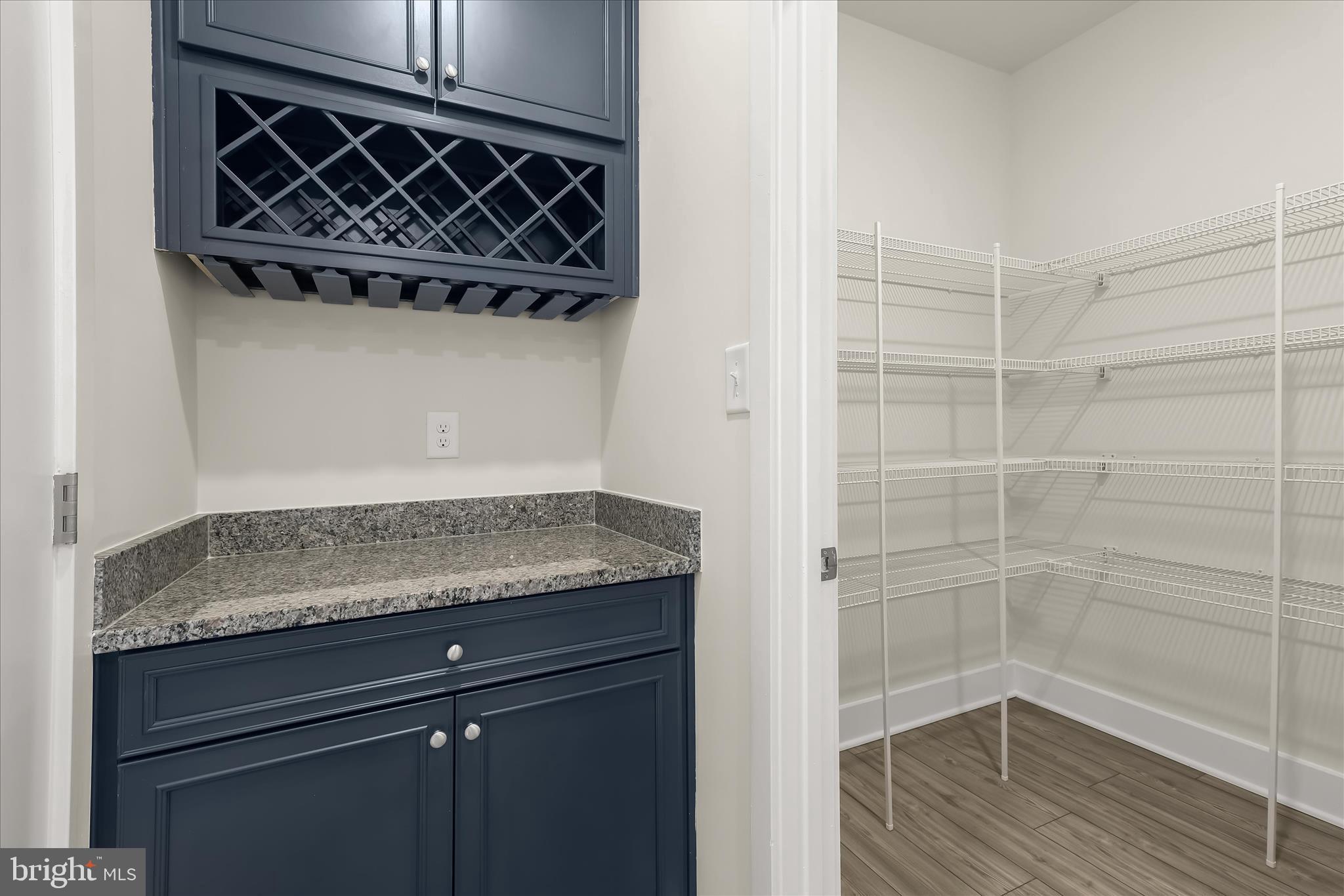 304 Sweetbay Road Essex, MD 21221 - Photo 13 of 66 a bathroom with a granite countertop sink a toilet and shower