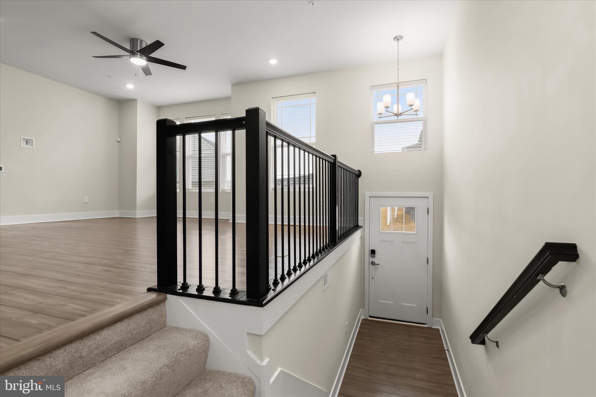 304 Sweetbay Road Essex, MD 21221 - Photo 2 of 66 a view of a hallway with stairs and a window