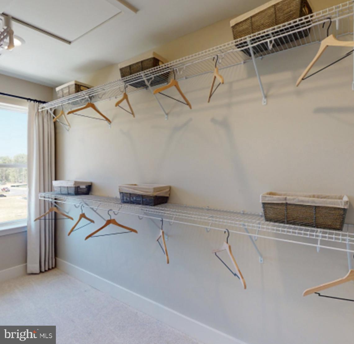 304 Sweetbay Road Essex, MD 21221 - Photo 24 of 66 a view of a room with racks on the wall