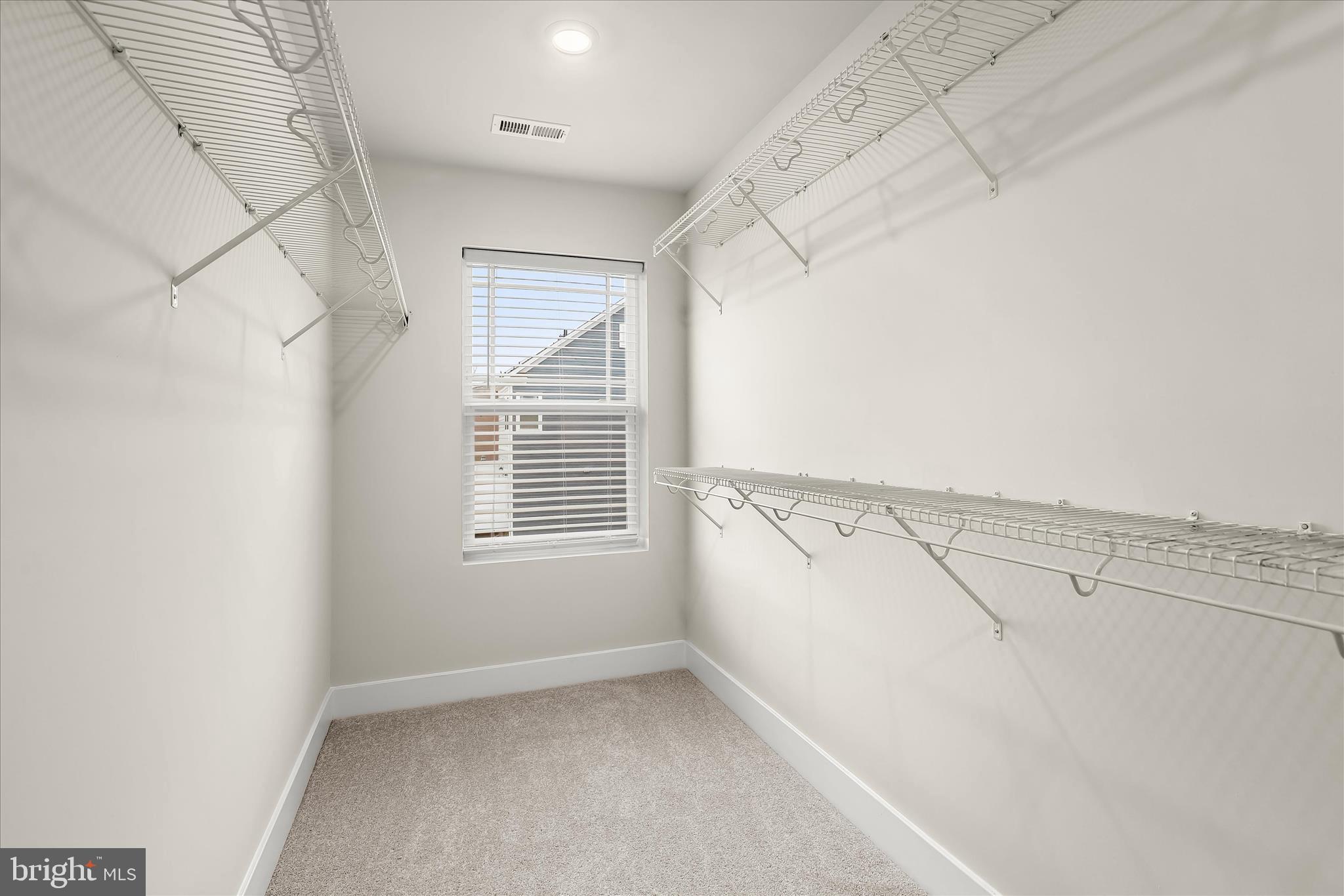 304 Sweetbay Road Essex, MD 21221 - Photo 25 of 66 a view of a room with racks on the wall