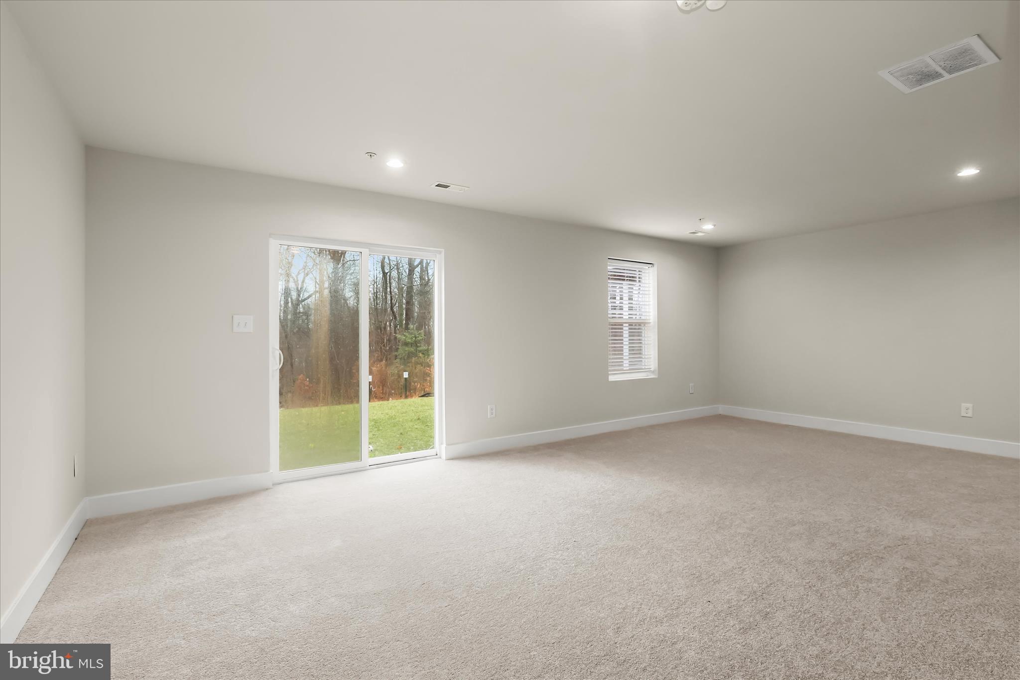 304 Sweetbay Road Essex, MD 21221 - Photo 40 of 66 a view of an empty room with a window