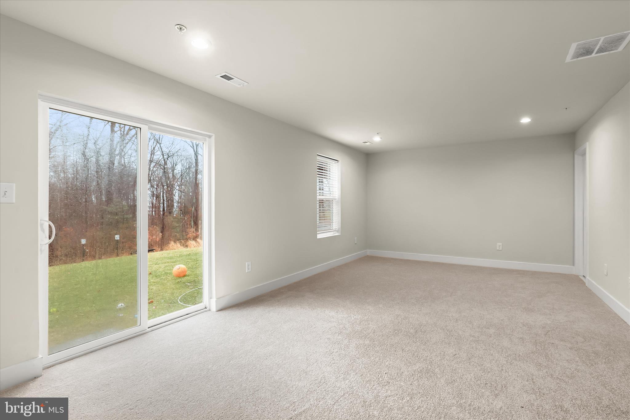 304 Sweetbay Road Essex, MD 21221 - Photo 42 of 66 an empty room with windows