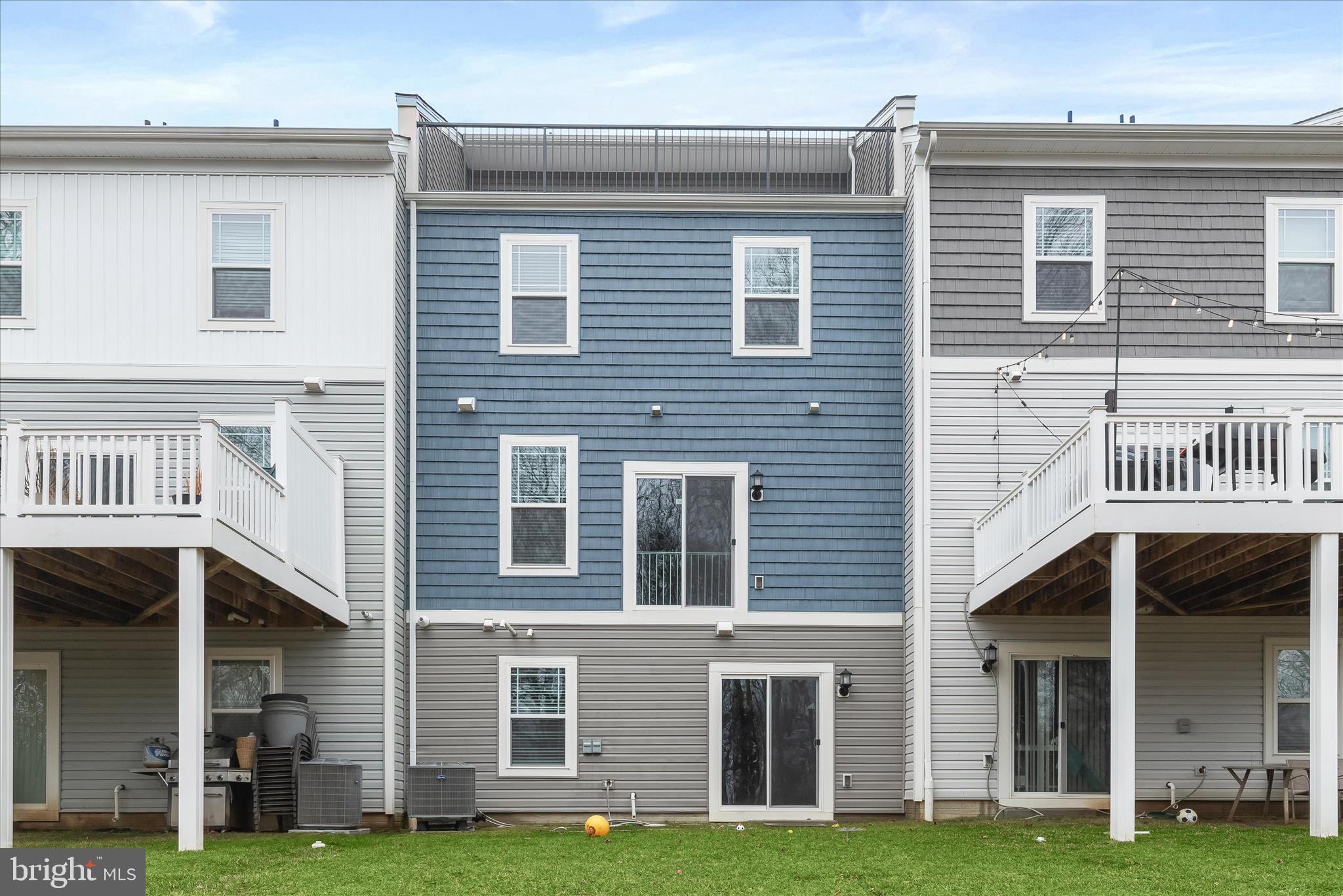 304 Sweetbay Road Essex, MD 21221 - Photo 46 of 66 a front view of a house with a yard