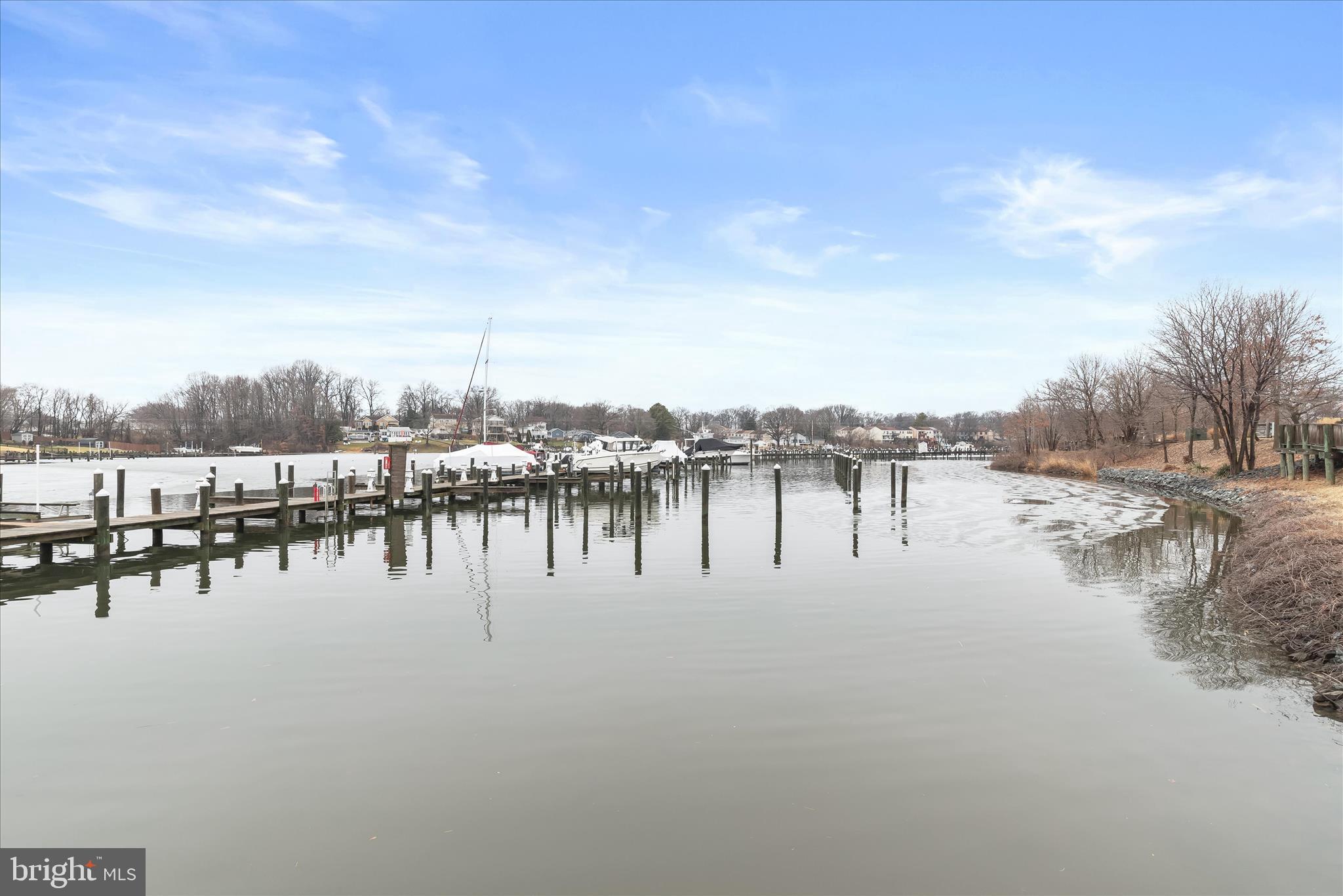 304 Sweetbay Road Essex, MD 21221 - Photo 54 of 66 a view of ocean with boats and trees in the background