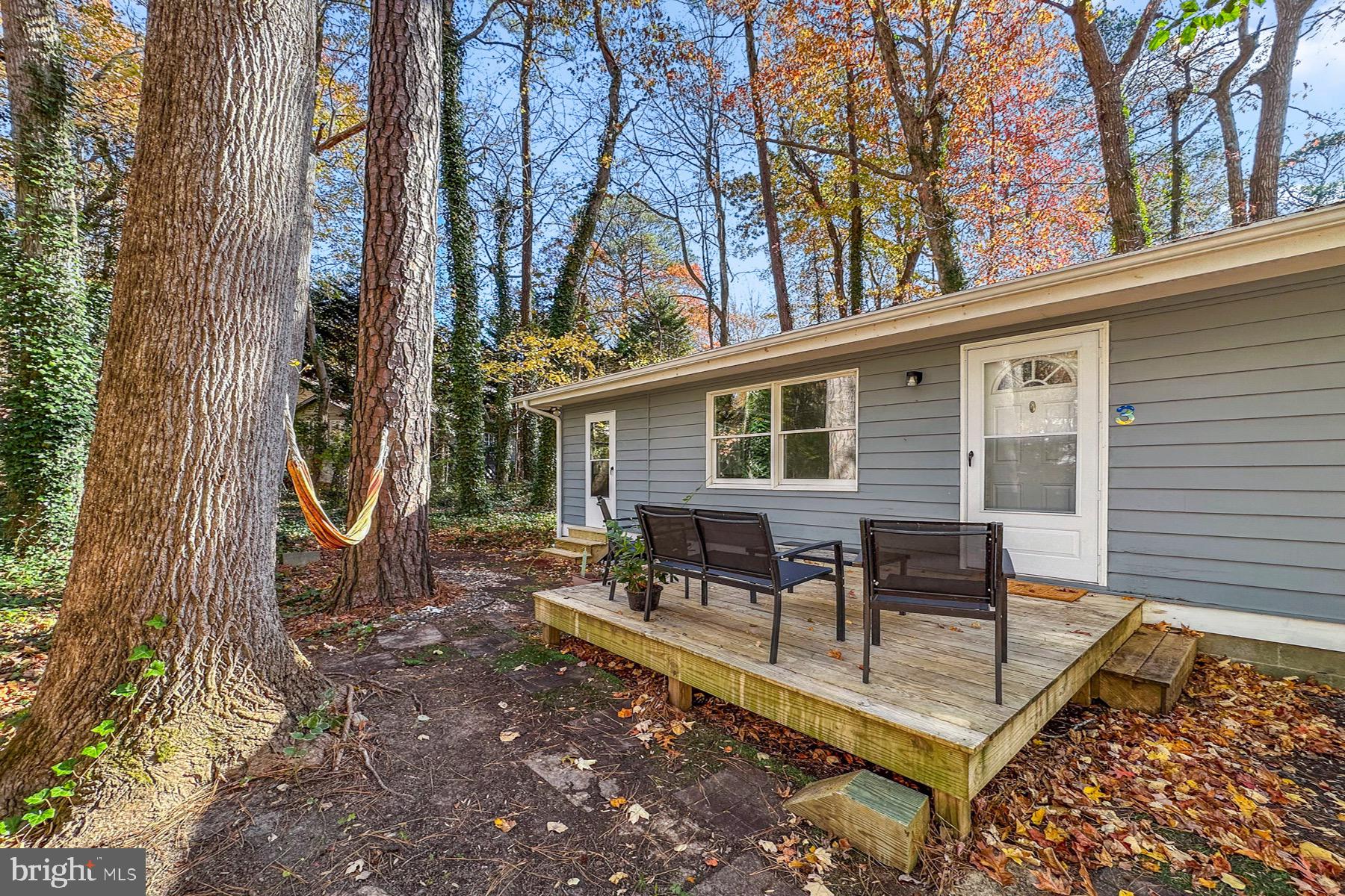 3 Birdnest Drive Ocean Pines, MD 21811 - Photo 1 of 29 a view of a house with backyard and sitting area