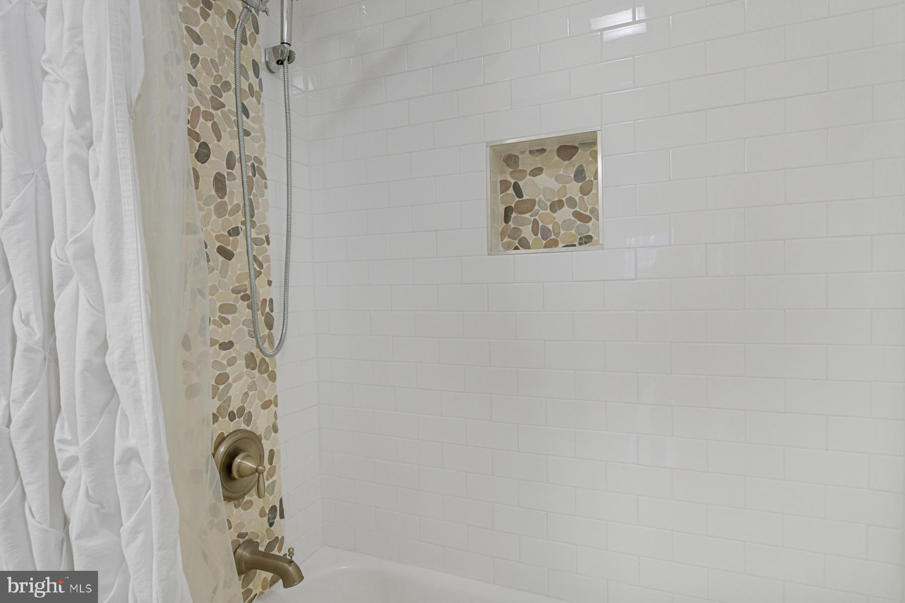 3 Birdnest Drive Ocean Pines, MD 21811 - Photo 18 of 29 a bathroom with a shower curtain and a sink