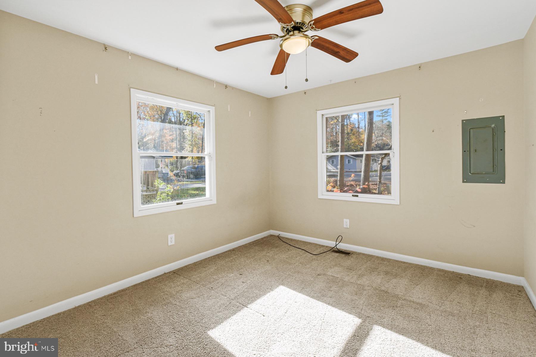 3 Birdnest Drive Ocean Pines, MD 21811 - Photo 19 of 29 an empty room with windows and fan